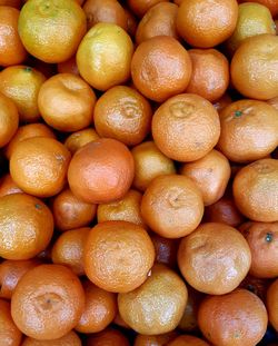 Full frame shot of oranges in market