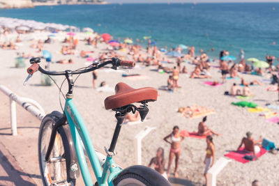 Bicycle at beach during sunny day