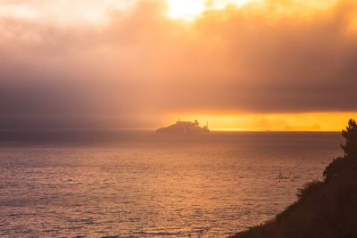 Scenic view of sea against sky during sunset