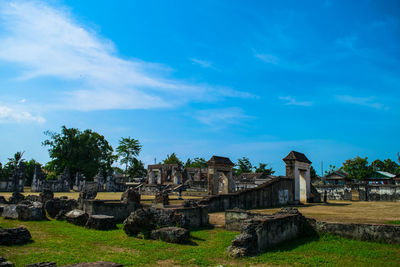 View of temple against cloudy sky