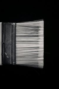 Stack of books on black background