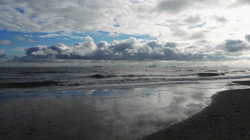 Scenic view of beach against sky