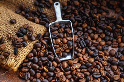 Close-up of coffee beans on table