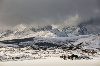 Scenic view of snowcapped mountains against sky