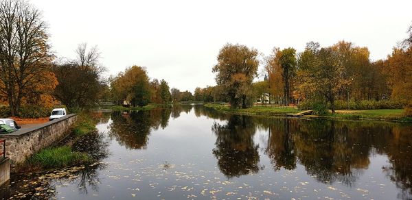 Scenic view of lake against sky during autumn