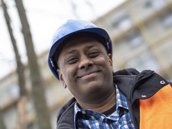 Portrait of young man standing outdoors