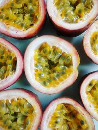 Close-up of cut passion fruits in plate