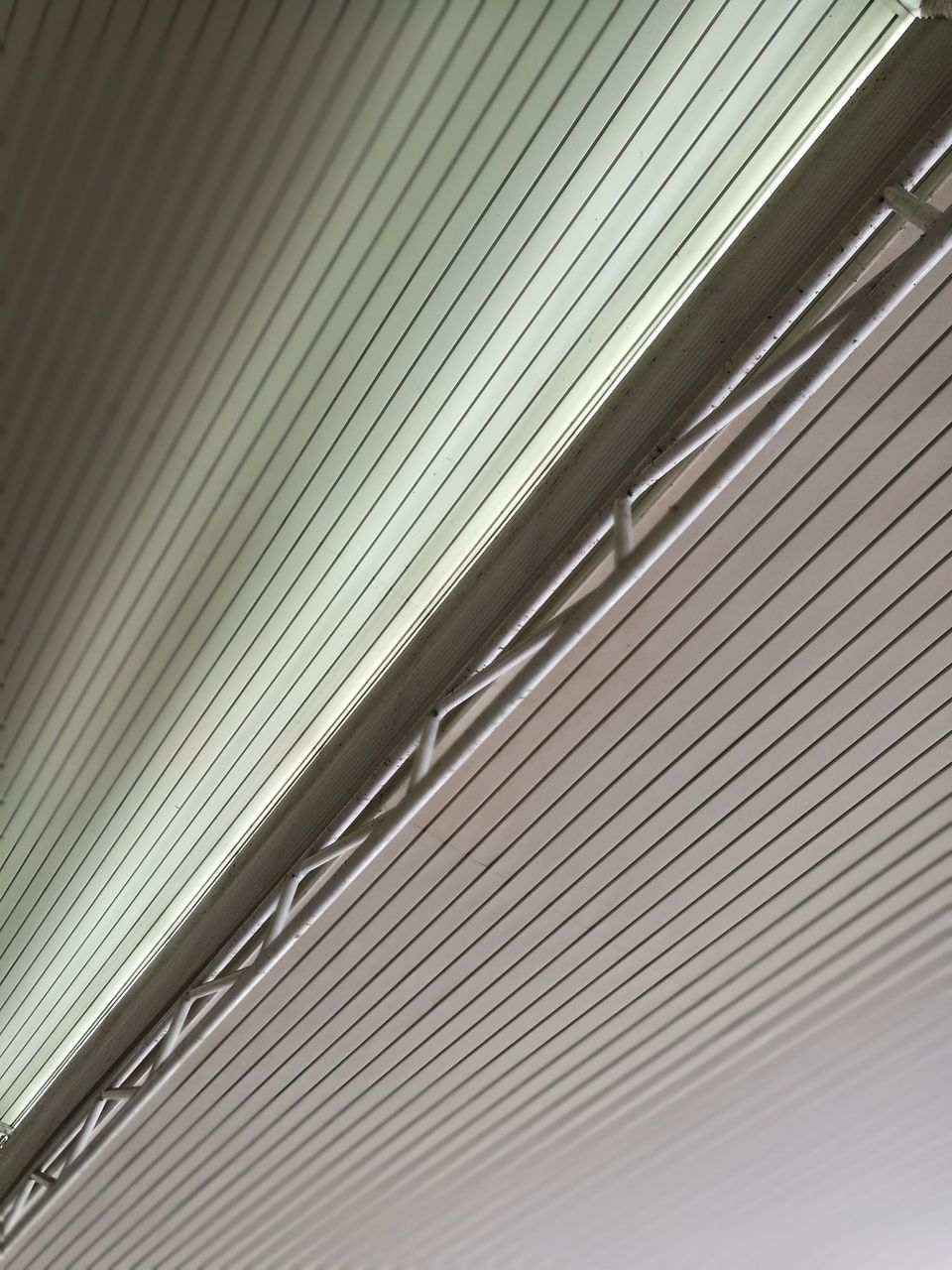 LOW ANGLE VIEW OF ARCHITECTURAL COLUMN OF BLINDS