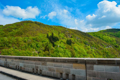 Scenic view of tree mountains against sky