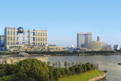 View of the bay of odaiba with daiba park,mall and hotels.