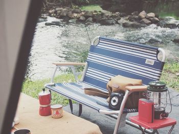 Close-up of chair on water