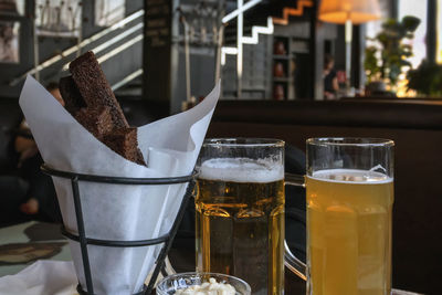 Close-up of beer glass on table