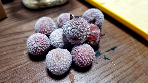 High angle view of strawberries on table