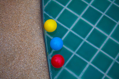 High angle view of multi colored ball on floor