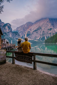 Rear view of lake against mountain range