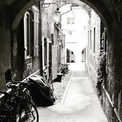 Narrow alley amidst buildings in city