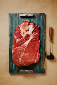 High angle view of ice cream on cutting board