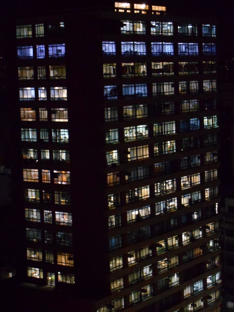 LOW ANGLE VIEW OF ILLUMINATED BUILDING