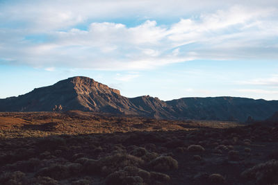 Scenic view of rocky mountains against sky