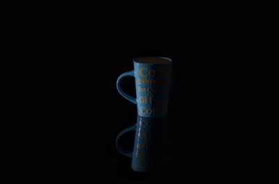 Close-up of drink against black background