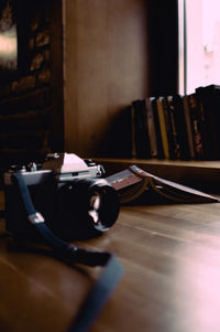 Close-up of open book on table at home