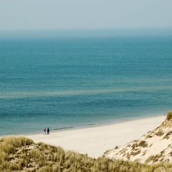 People walking at beach