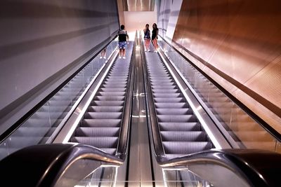 People on escalator