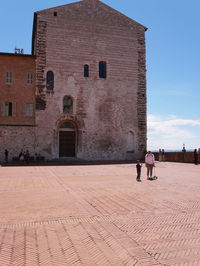 People in front of building