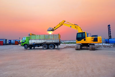 View of construction site against sky during sunset