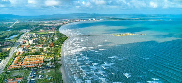 Beautiful caribbean road with palm trees along the coast of venezuela, tucacas hotel zone