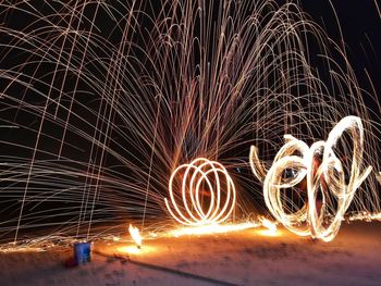 Firework display at night