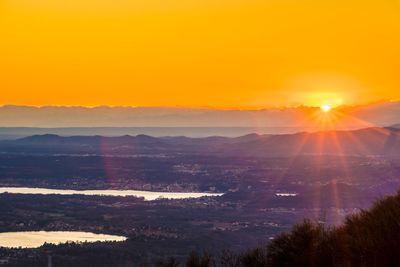 Scenic view of silhouette landscape against sky during sunset