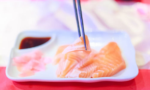 Close-up of fish in plate on table
