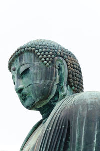 Close-up of statue against clear sky