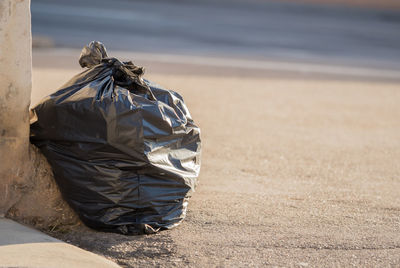 Close up of plastic bag on road