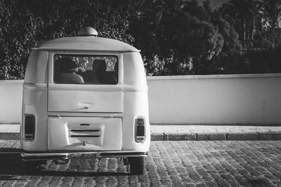 Rear view of vintage car on street