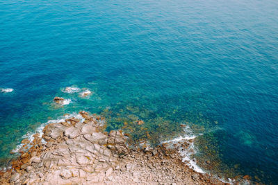 High angle view of rocks on beach