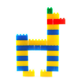 Close-up of toys over white background