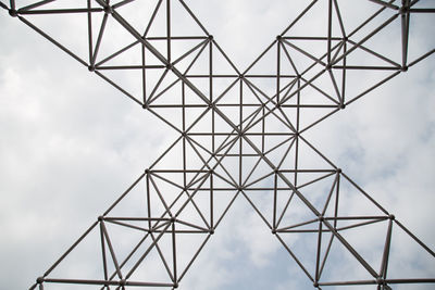 Low angle view of metallic structure against sky