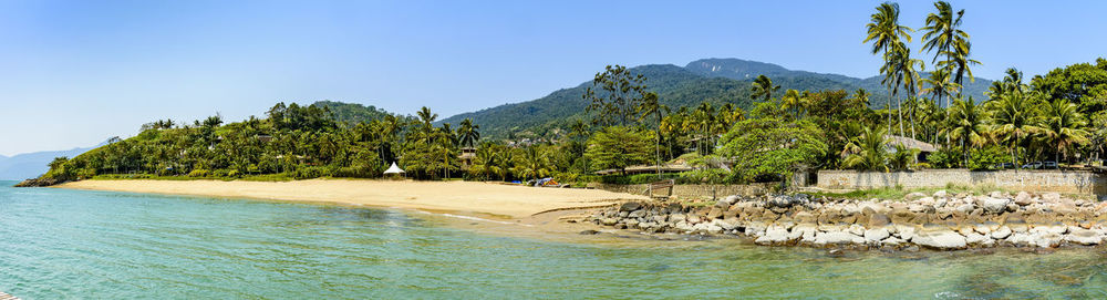 Scenic view of sea against clear sky on ilhabela island