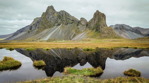 Scenic view of vestrahorn mountain with reflection on lake