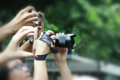 People photographing from cameras