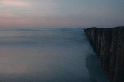 Scenic view of sea at sunset