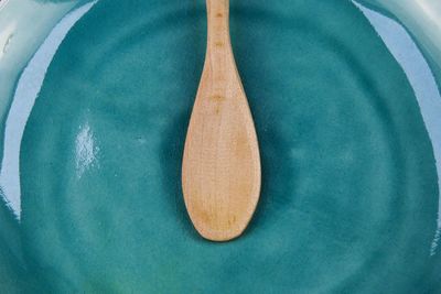 High angle view of blue and table against green background