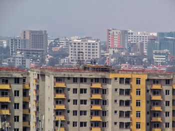 High angle view of buildings against sky