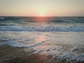 Scenic view of sea against sky during sunset