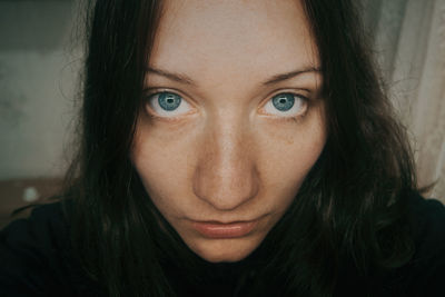 Close-up portrait of young woman