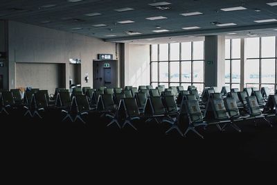 Row of empty chairs in airport