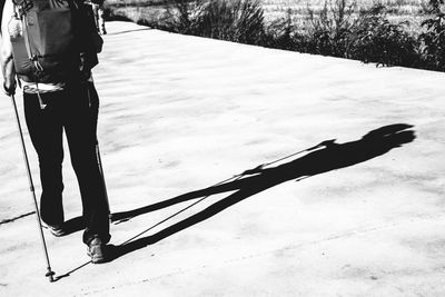 Low section of man standing on floor