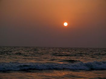 Scenic view of sea at sunset